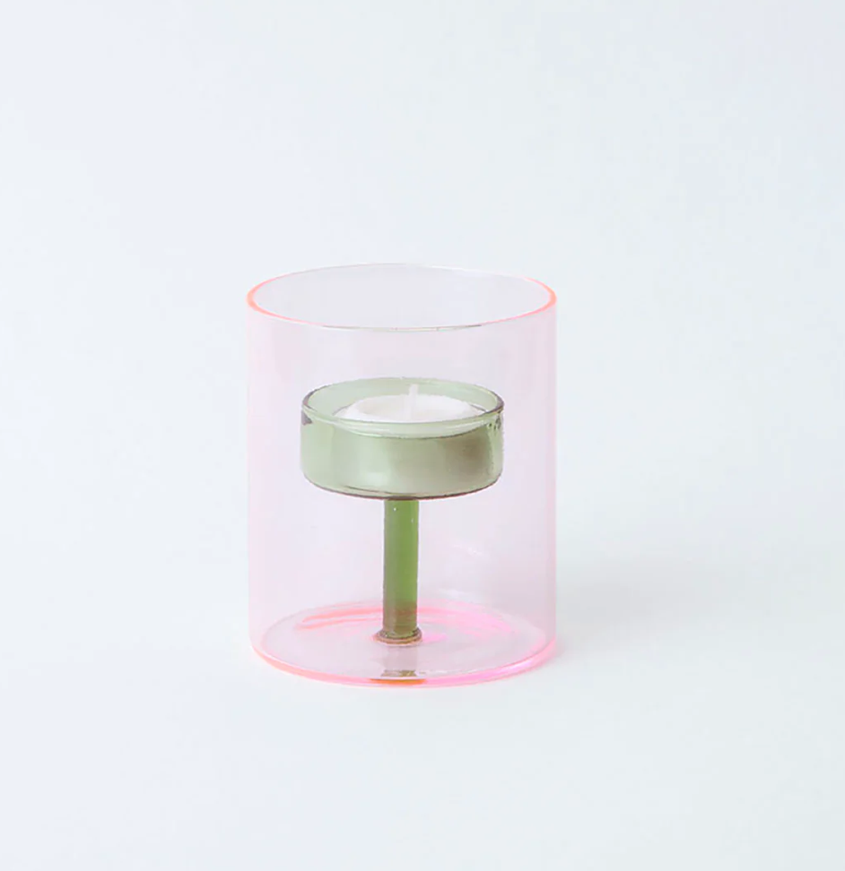 Clear glass cylindrical tea light holder with light pink exterior & green interior candle holder