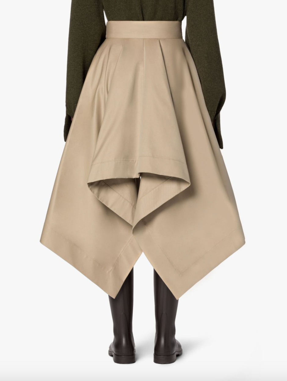 Back view: Female model wearing a tan gabardine skirt