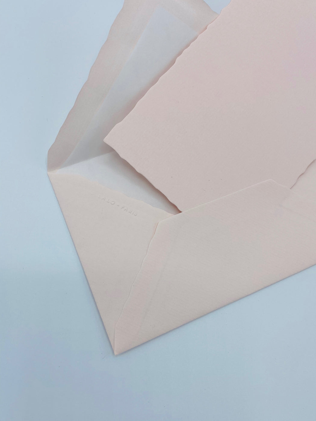 Pale pink note card and envelope
