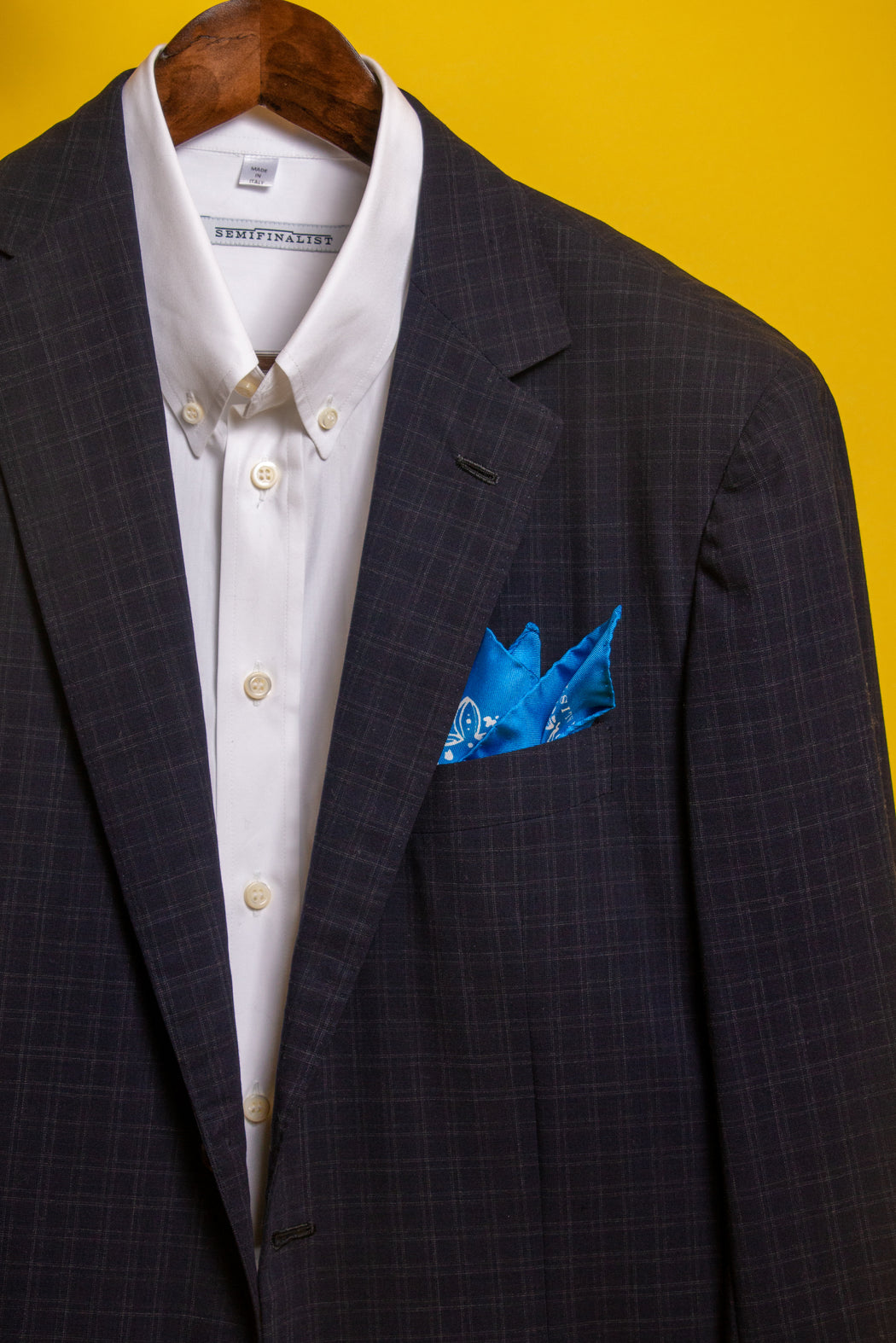 Classic blue silk bandana in jacket pocket