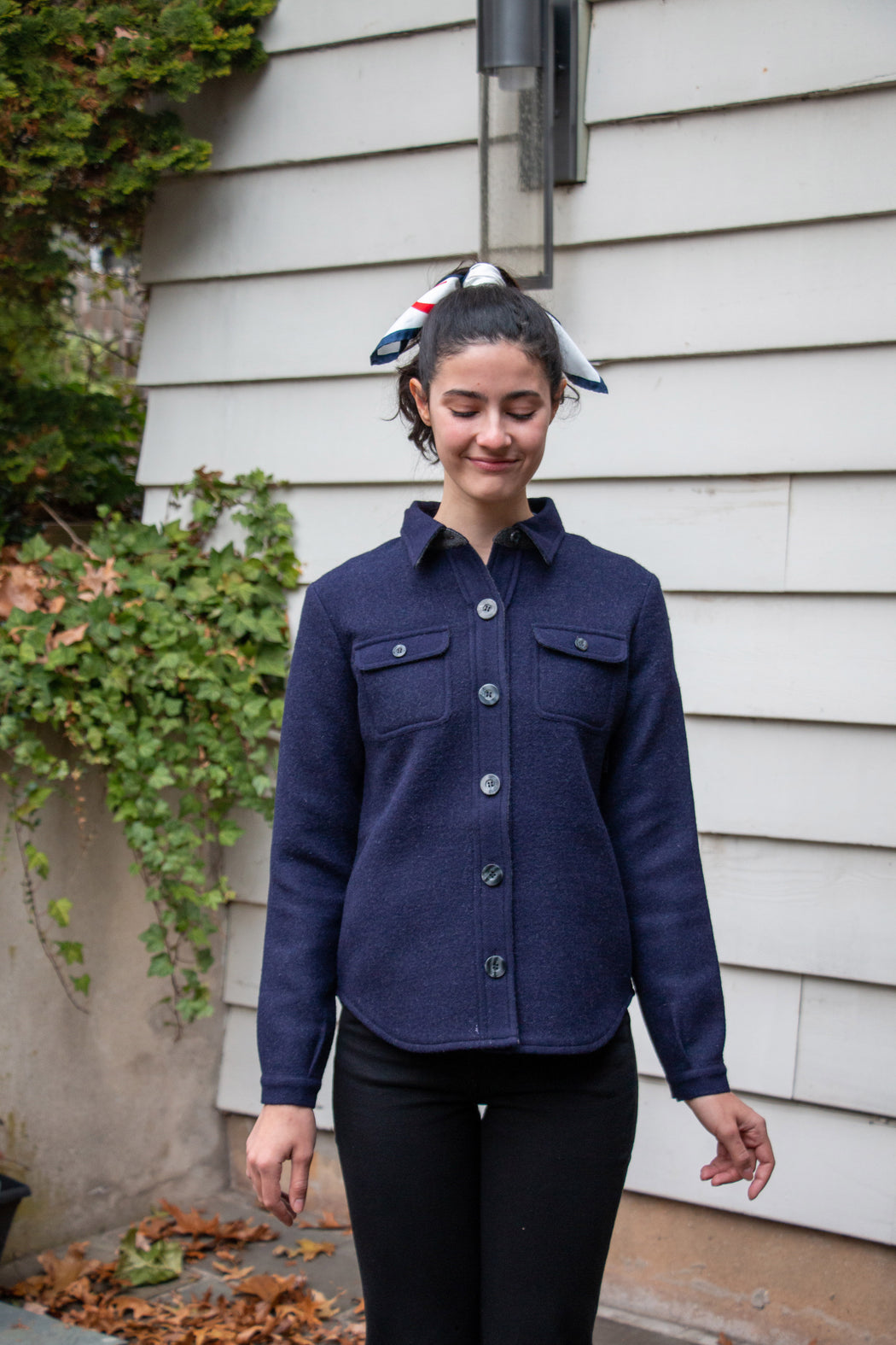 Model wearing navy 2 patch pocket button front overshirt