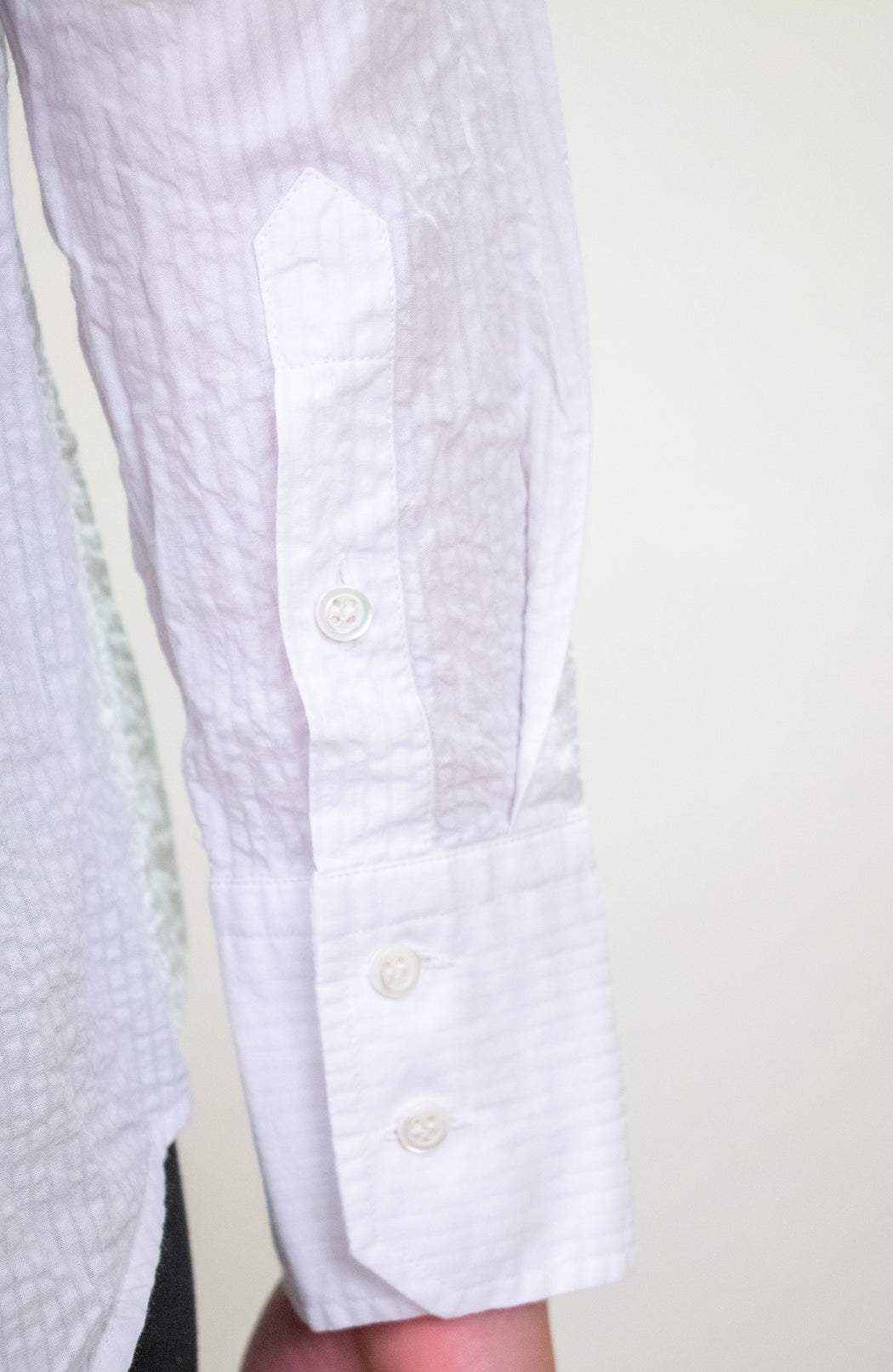 White double button shirt cuff detail