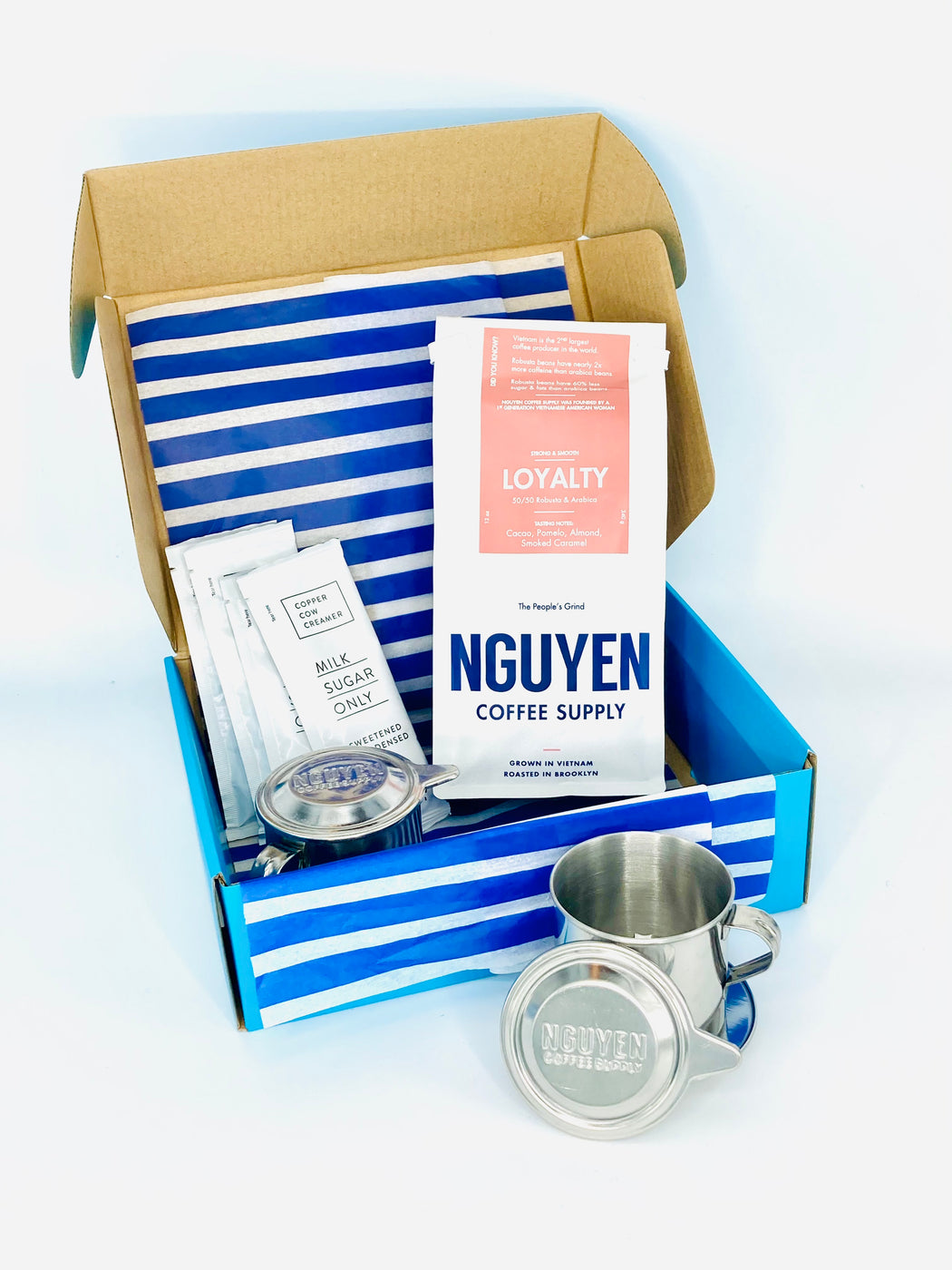 Bag of Vietnamese Coffee in a box with Filters and Condensed Milk Packets