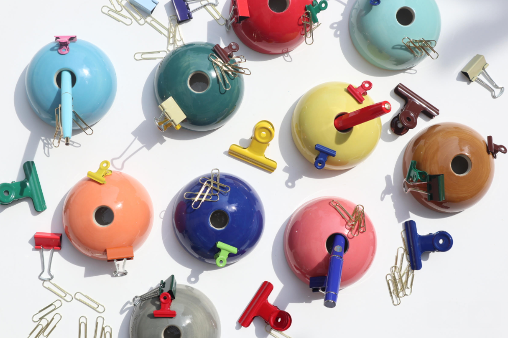 Multi-color Hemisphere Magnetic Ceramic Paperweights surrounded by metal clips