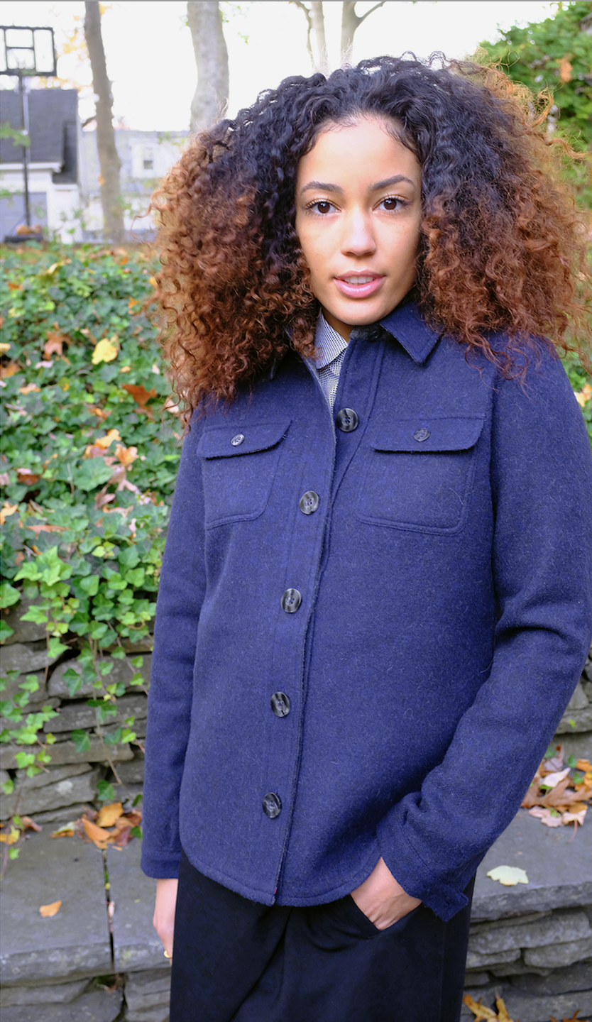 Model wearing navy 2 patch pocket button front overshirt