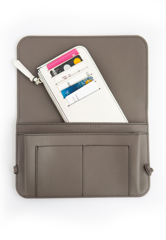 Grey leather wallet clutch with white interior card holder