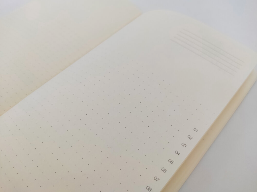 Interior page from the Timeless Agenda notebook showing lightly dotted background & time markers