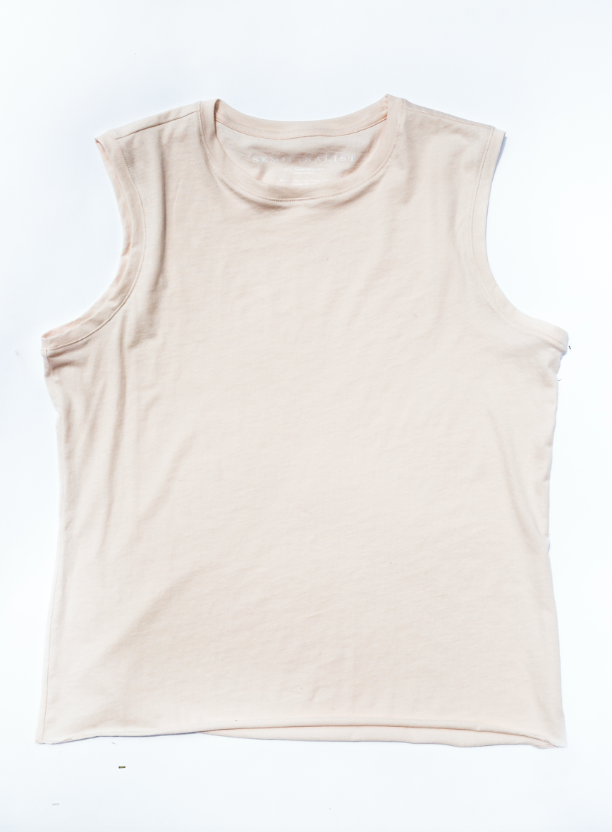Light pink sleeveless crew neck t-shirt