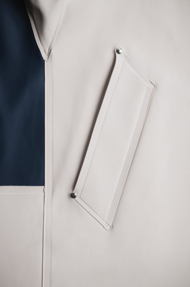 Close-up of double welded seams around pocket opening