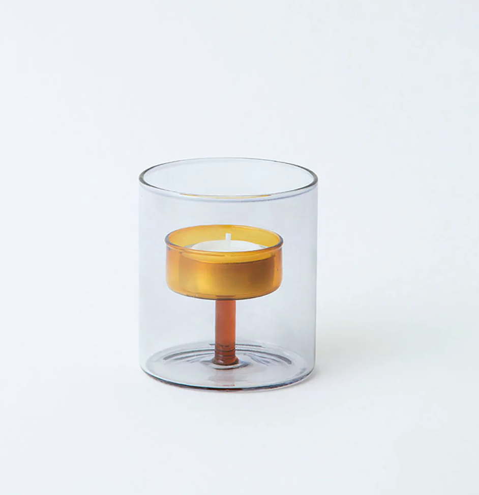 Clear glass cylindrical tea light holder with grey exterior & orange interior  candle holder 