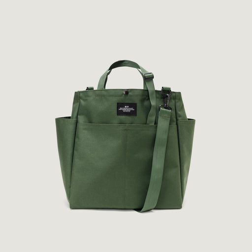 Olive colored tote bag with snap closure, exterior pockets, top handles & shoulder strap (front view)