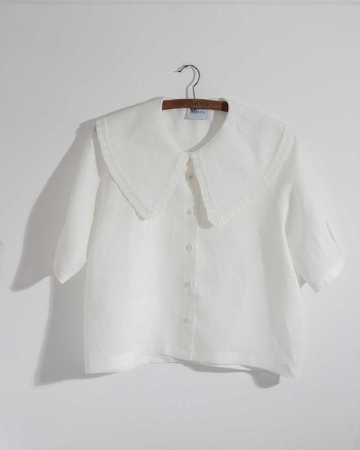 White short sleeve women's blouse with pleated edge oversized collar