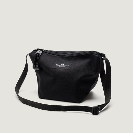 Black small nylon canvas bag with zip closure & adjustable shoulder strap