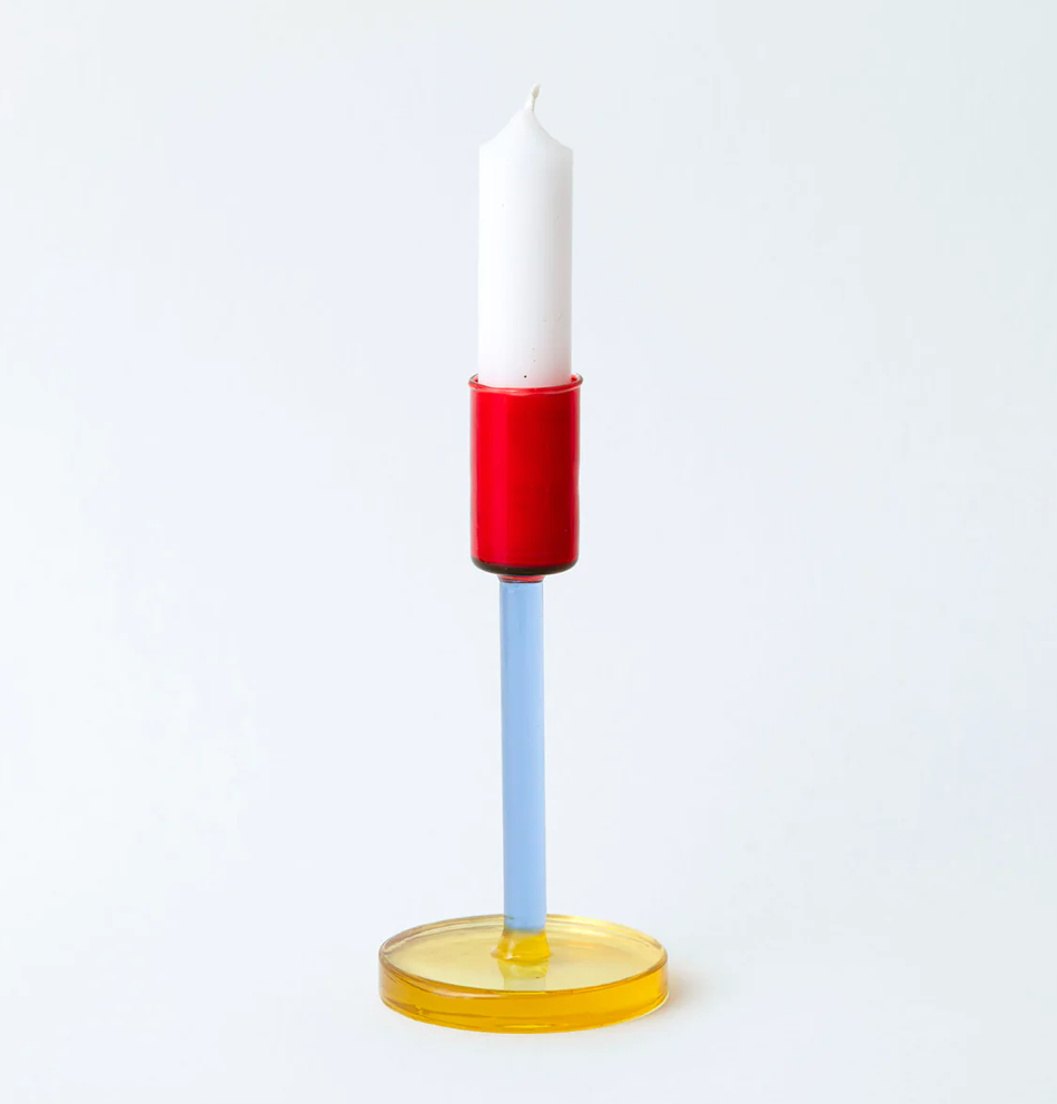 Blue & red glass candlestick holder with yellow base and white candle