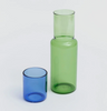 Green glass carafe with blue drinking glass & lid