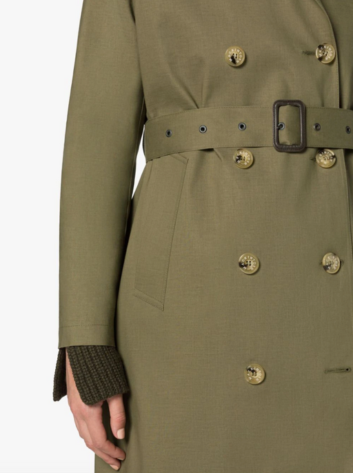 Close-up view of khaki green colored trench coat, double breast buttons  & waist belt