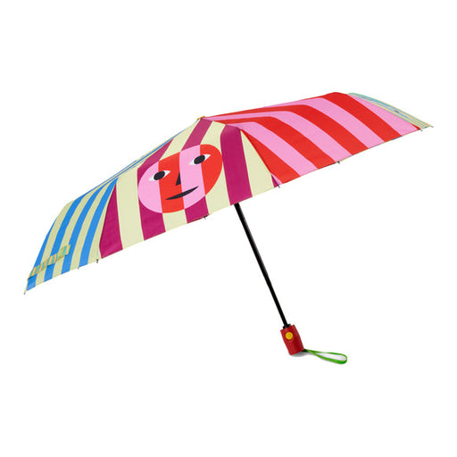 Side view: multi-color striped umbrella with smiley face graphic