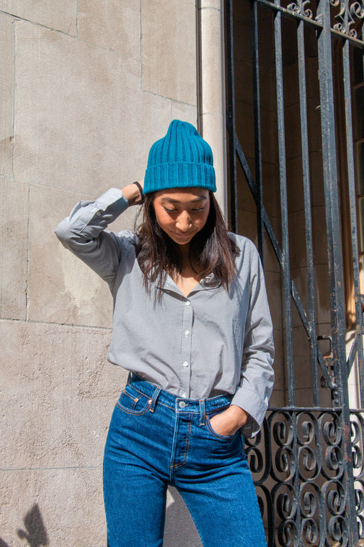 Girl wearing blue chunky cashmere beanie hat