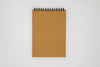 Back cover:  Mnemosyne Note Pad with top spiral binding