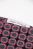 Close up of semifinalist logo on green and pink geometric cashmere scarf
