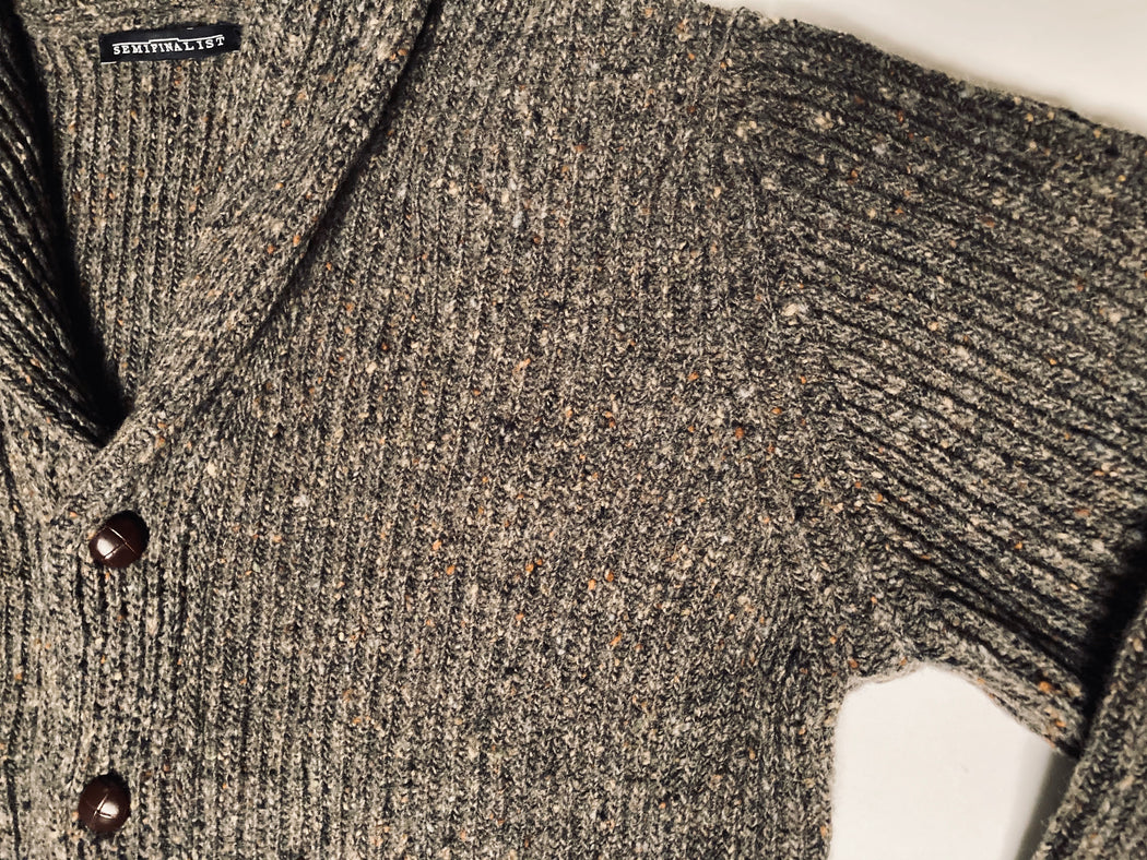 Close-up of brown/grey button-down sweater with shawl collar