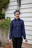 Model wearing navy 2 patch pocket button front overshirt