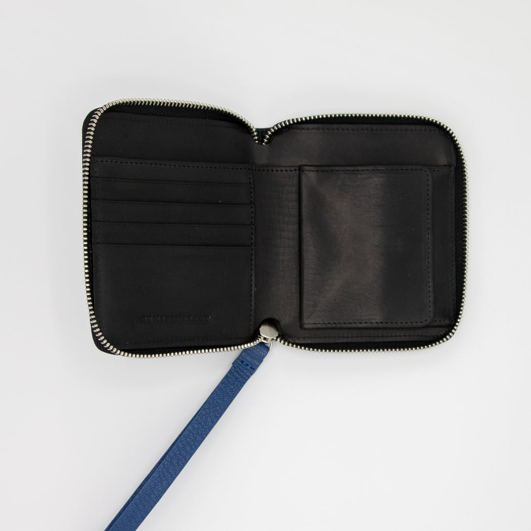 Interior view: Black leather zip-around wallet with card, coin & currency pockets 