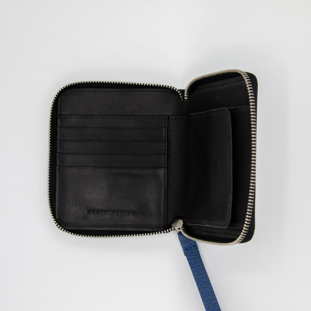 Interior view:  Black leather zip-around wallet with card and coin pockets