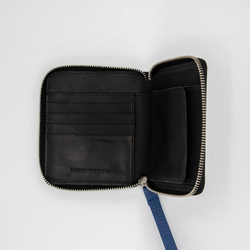 Interior view:  Black leather zip-around wallet with card and coin pockets