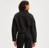 Back view of model wearing black cropped jean jacket