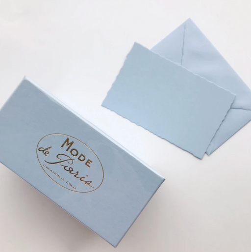 Light blue note card and envelope