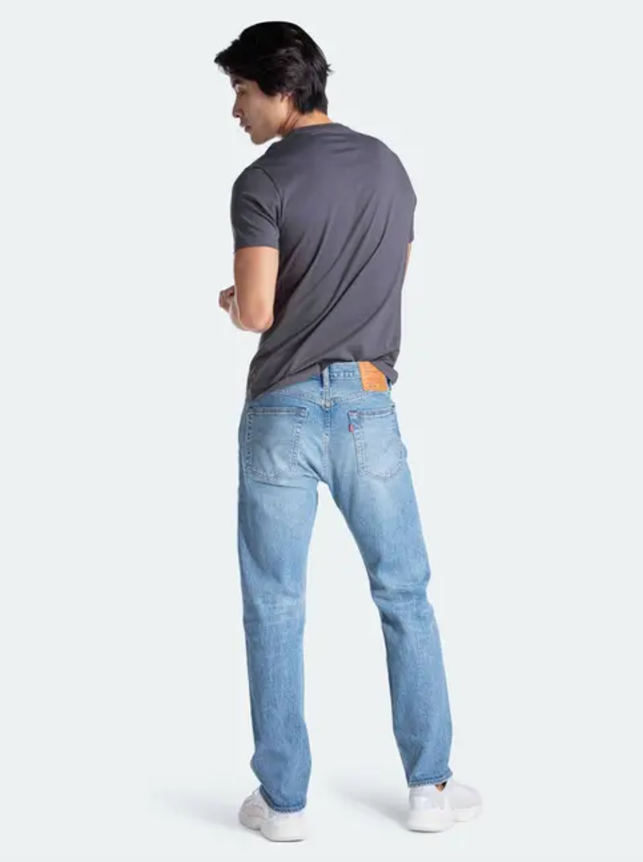 Back view: Male model wearing Levi's 501® '93 Straight Fit Jeans