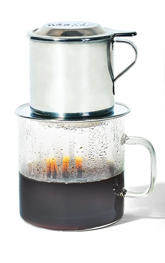 Glass Mug of Brewed Coffee, with filter device on top
