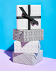 4 stacked boxes wrapped in black & white All Occasion Gift Wrap 