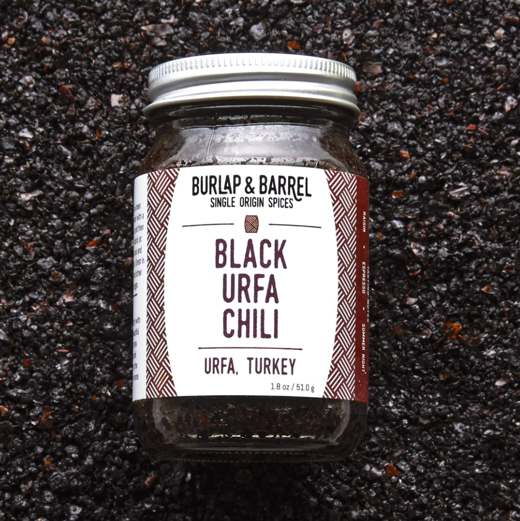 1.8 ounce glass jar of Black Urfa Chili from Turkey