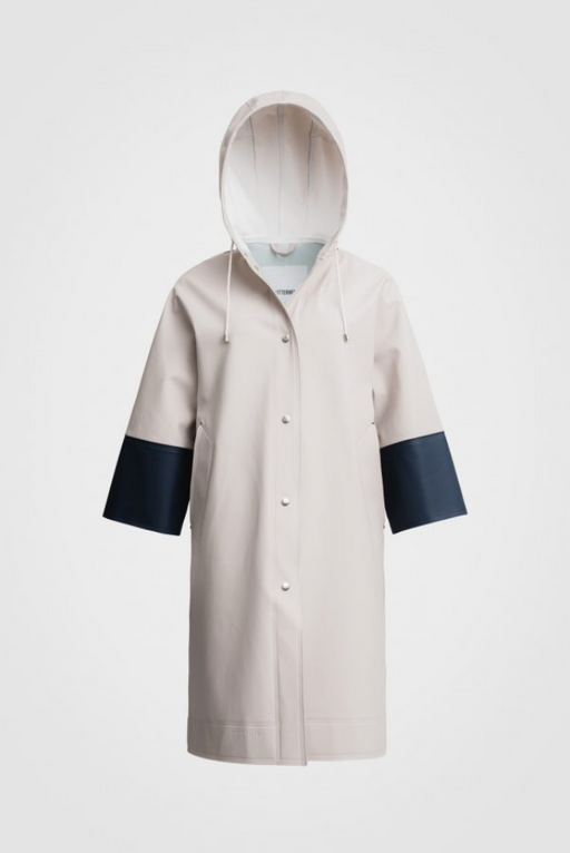 White hooded raincoat with snap closure & wide navy trim sleeves