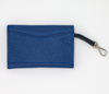 Two rear pockets on blue leather card case with navy clip strap
