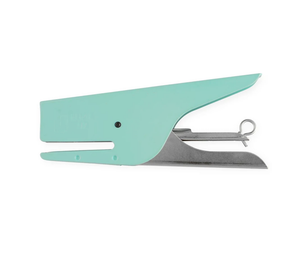 Turquoise colored hand stapler