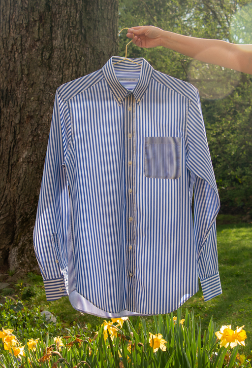 Blue & white striped button down long sleeve shirt with collar on hanger - front view
