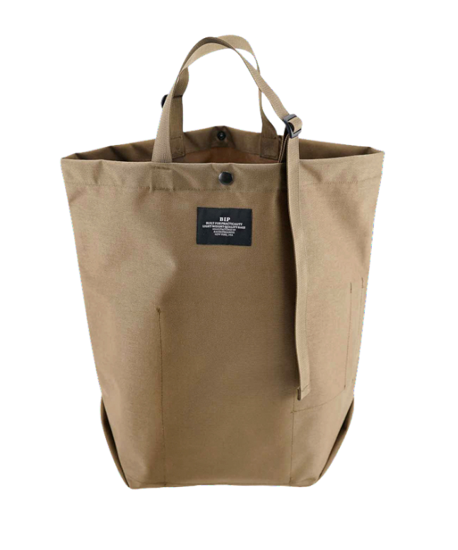 Khaki colored canvas tote with snap closure and adjustable straps