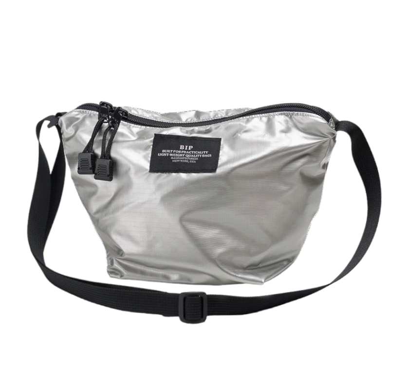 Small silver tote bag with black zipper and shoulder strap
