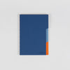 Dark blue cover notebook with light blue and orange tabs